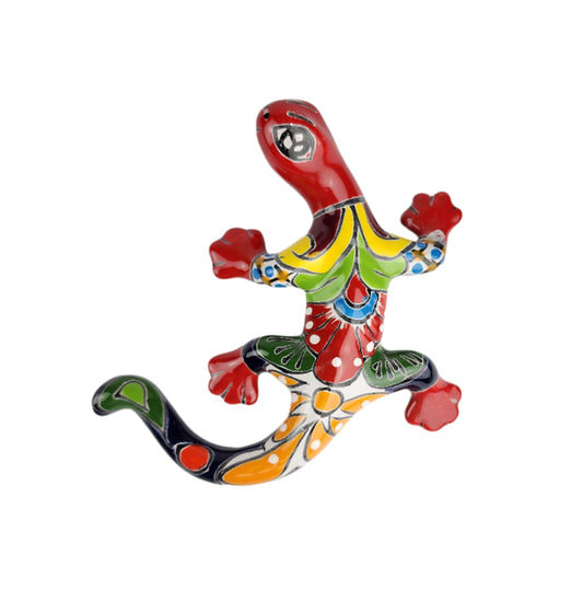 Colorful ceramic lizard wall art on a white background