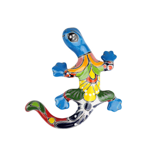 Colorful ceramic lizard wall art on a white background