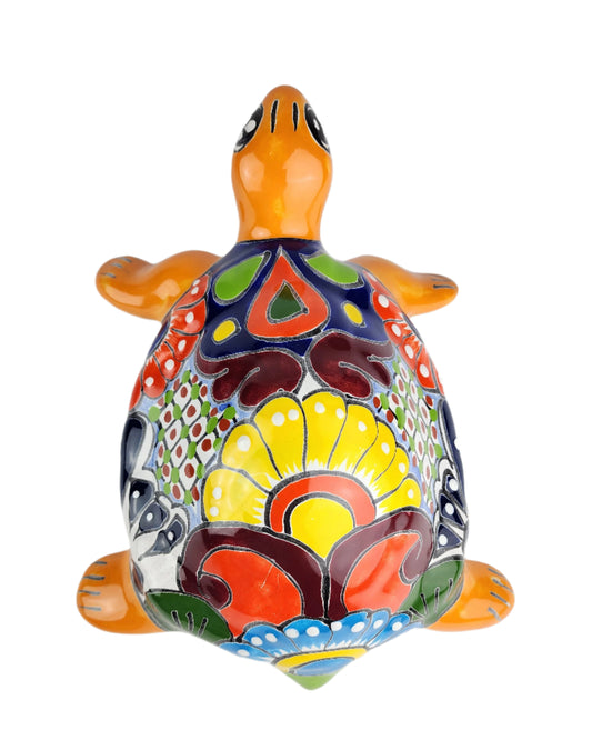 Colorful ceramic turtle on a white background
