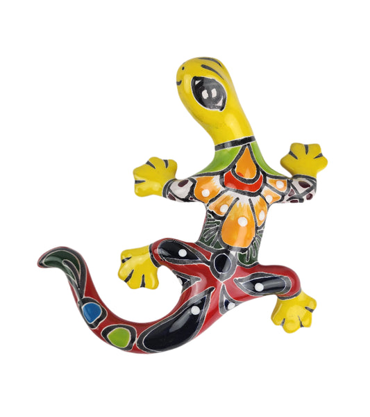 Colorful ceramic lizard on a white background