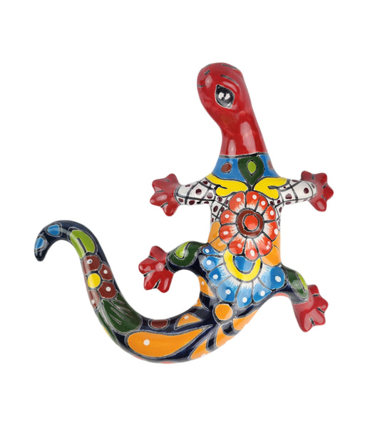 Colorful ceramic lizard sculpture on a white background