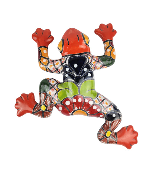 Colorful ceramic frog sculpture on a white background