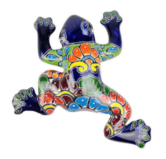 Colorful ceramic frog sculpture on a white background