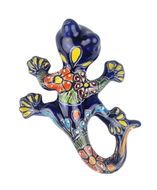 Colorful ceramic lizard on a white background