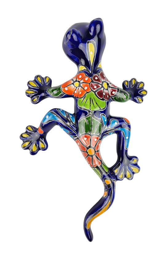 Colorful ceramic lizard wall art on a white background