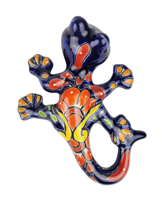 Colorful ceramic lizard on a white background