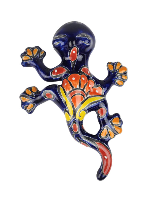 Decorative ceramic lizard with colorful patterns on a white background