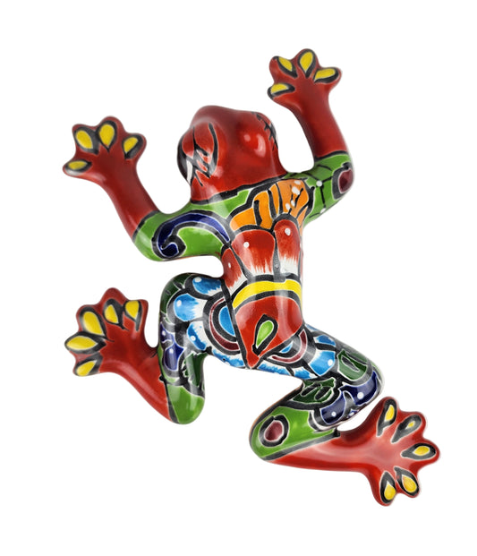 Colorful ceramic frog sculpture on a white background