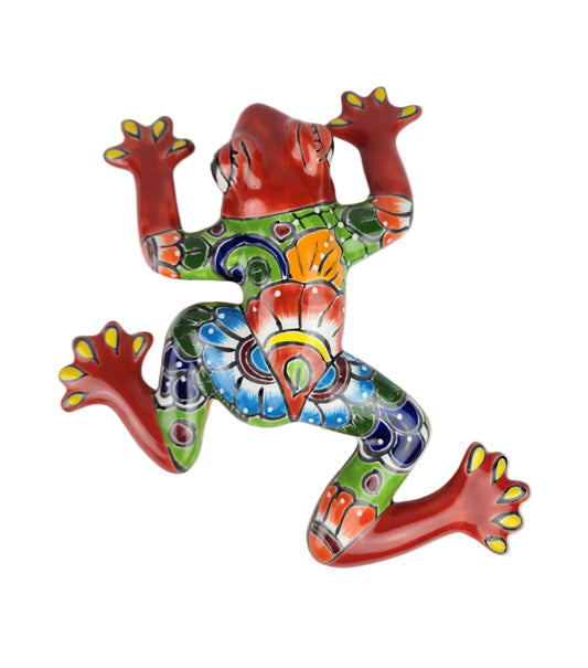 Colorful ceramic frog sculpture on a white background
