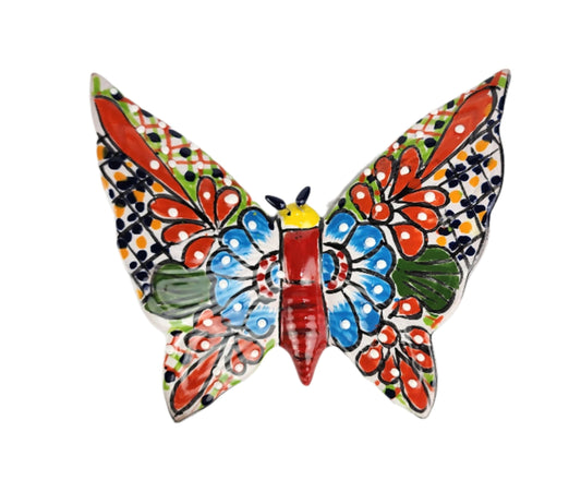Decorative butterfly wall art with colorful patterns on a white background