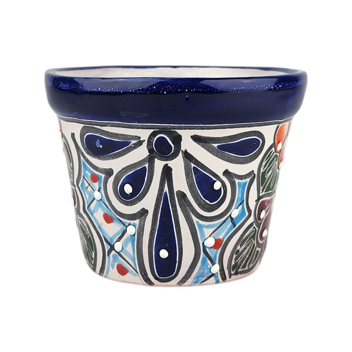 A hand-painted ceramic planter pot with a deep cobalt blue glazed rim and a white body decorated with blue, black, light blue, green, and red hand-painted patterns.