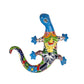 Colorful ceramic lizard wall art on a white background
