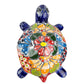 Colorful ceramic turtle on a white background