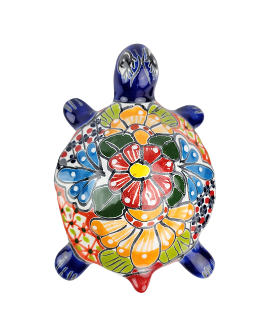 Colorful ceramic turtle on a white background
