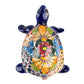 Colorful turtle figurine with floral patterns on a white background