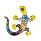 Colorful ceramic lizard figurine on a white background
