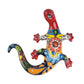 Colorful ceramic lizard sculpture on a white background