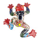 Colorful ceramic frog wall art on a white background