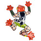 Colorful ceramic frog sculpture on a white background