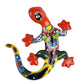 Colorful ceramic lizard wall art on a white background