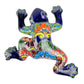 Colorful ceramic frog sculpture on a white background