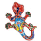 Colorful ceramic lizard on a white background