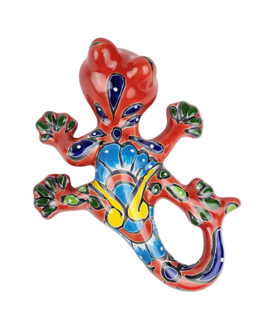 Colorful ceramic lizard on a white background