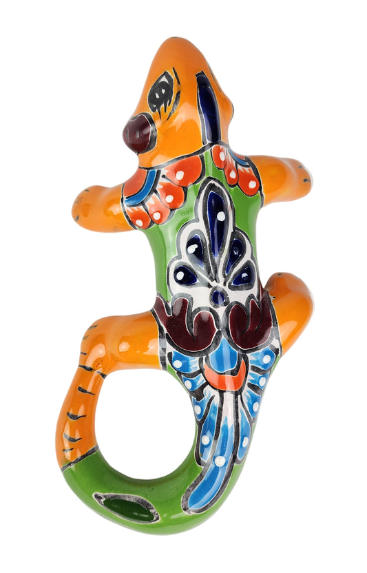 Colorful ceramic lizard on a white background
