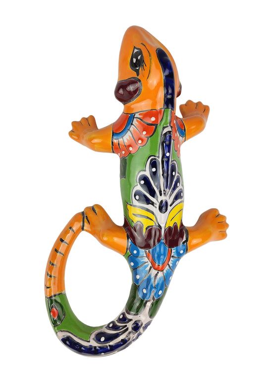 Colorful ceramic lizard on a white background