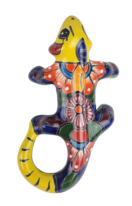 Colorful ceramic lizard on a white background