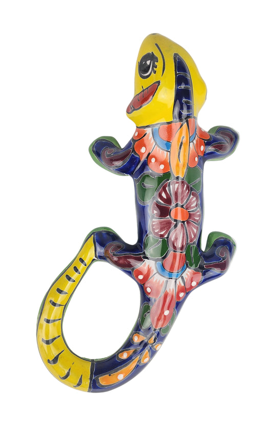 Colorful ceramic lizard on a white background