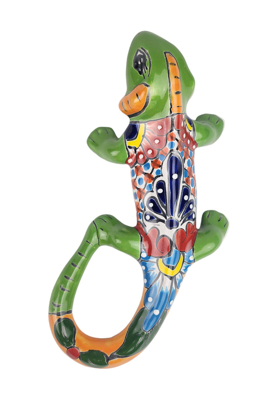Colorful ceramic lizard on a white background