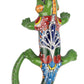 Colorful ceramic lizard sculpture on a white background