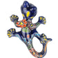 Colorful ceramic lizard on a white background
