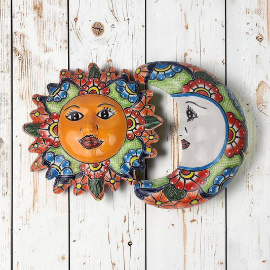 Talavera-style Sun and Moon ceramic wall décor set with colorful floral patterns on rustic white wood background