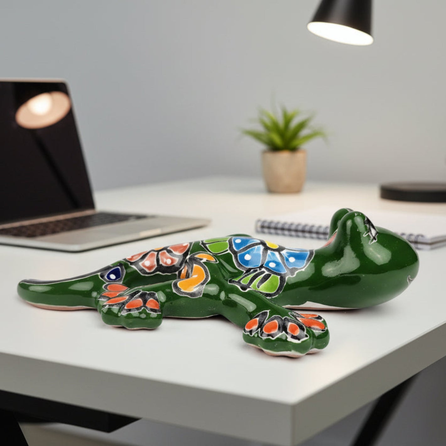 Decorative ceramic salamander with colorful patterns