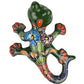 Colorful ceramic lizard on a white background