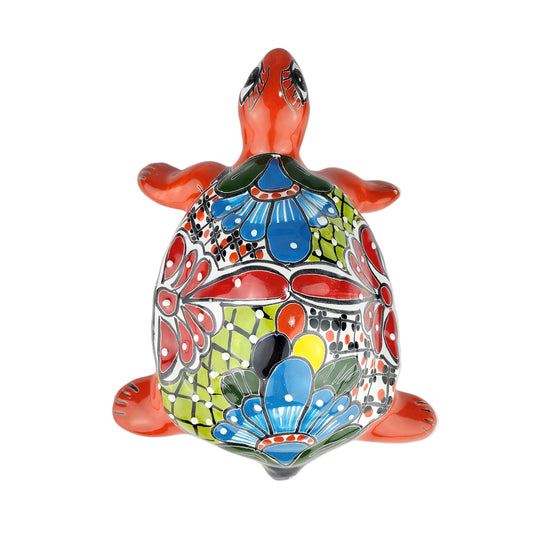 Colorful turtle with floral patterns on a white background