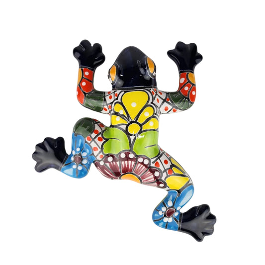 Colorful ceramic frog on a white background