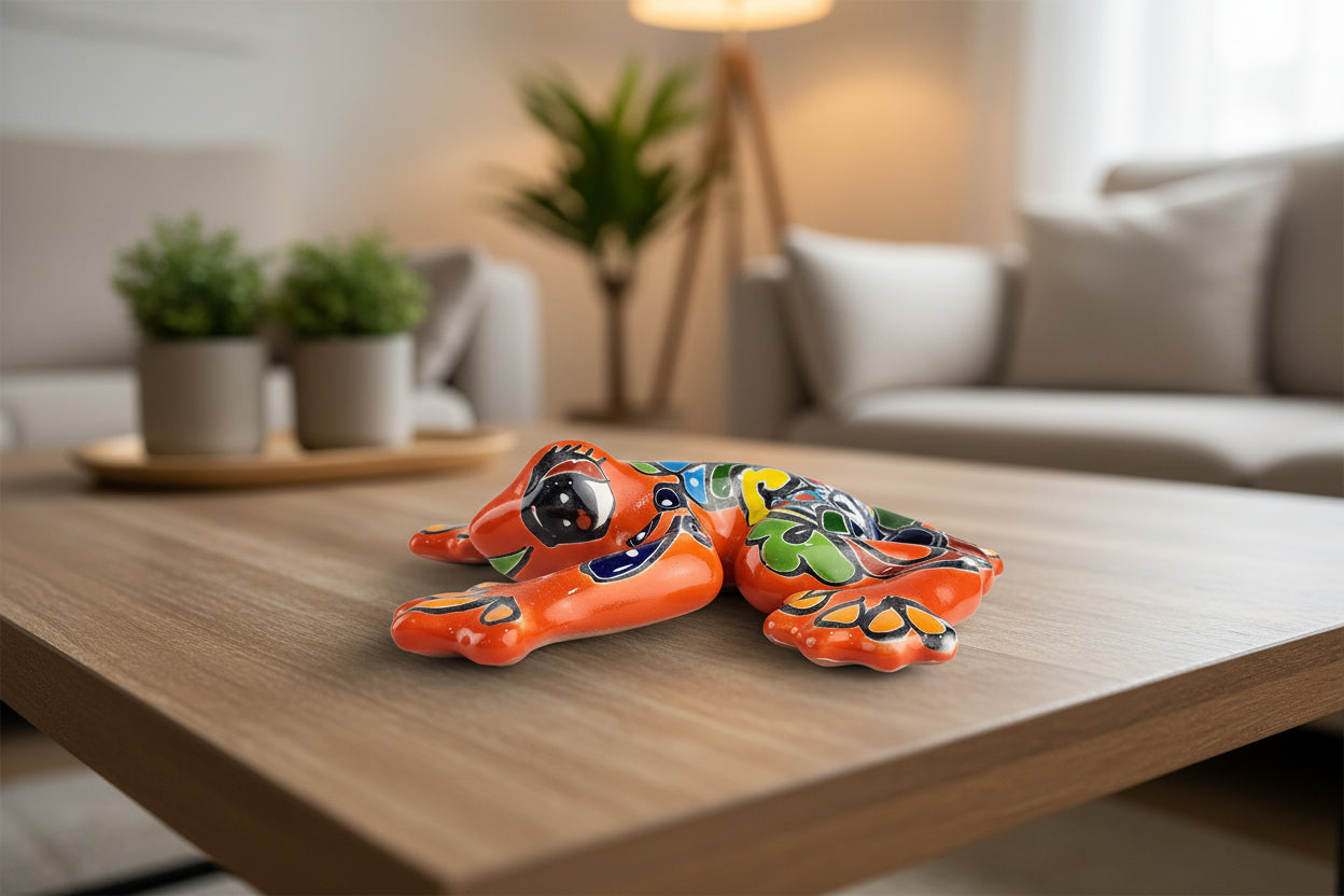 Colorful ceramic frog on a coffee table