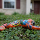 Decorative ceramic frog with colorful patterns 