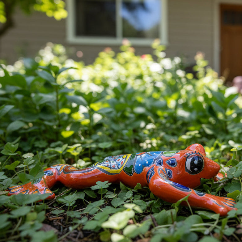 Colorful orange frog in a garden