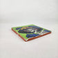 Angled view of lime green Catrina Portrait ceramic tile showing glossy surface and natural terracotta edges