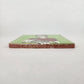 Lime green Frida Kahlo ceramic tile shown from front edge highlighting ceramic thickness and natural terracotta edge