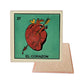 El Corazon #27 Loteria ceramic coaster with heart card artwork and cork-backed reverse on a white background
