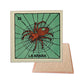 La Araña #33 Loteria ceramic coaster with spider card artwork and cork-backed reverse on a white background
