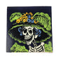 Navy blue Catrina Portrait ceramic tile with floral hat and Mexican folk art design
