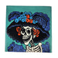 Teal Catrina Portrait ceramic tile with floral hat and Mexican folk art design