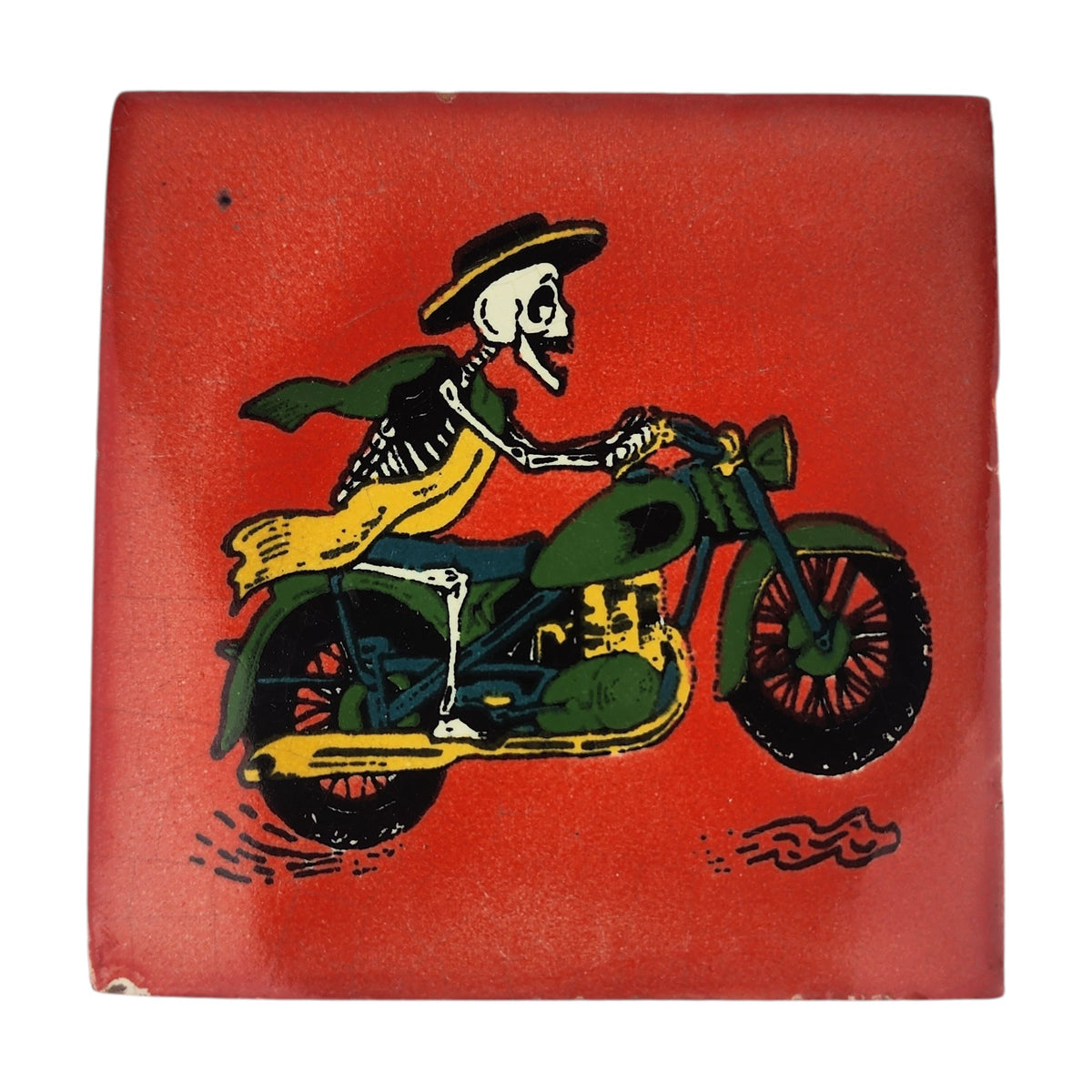 Skeleton Motorcycle ceramic tile with red background and colorful Mexican folk art design