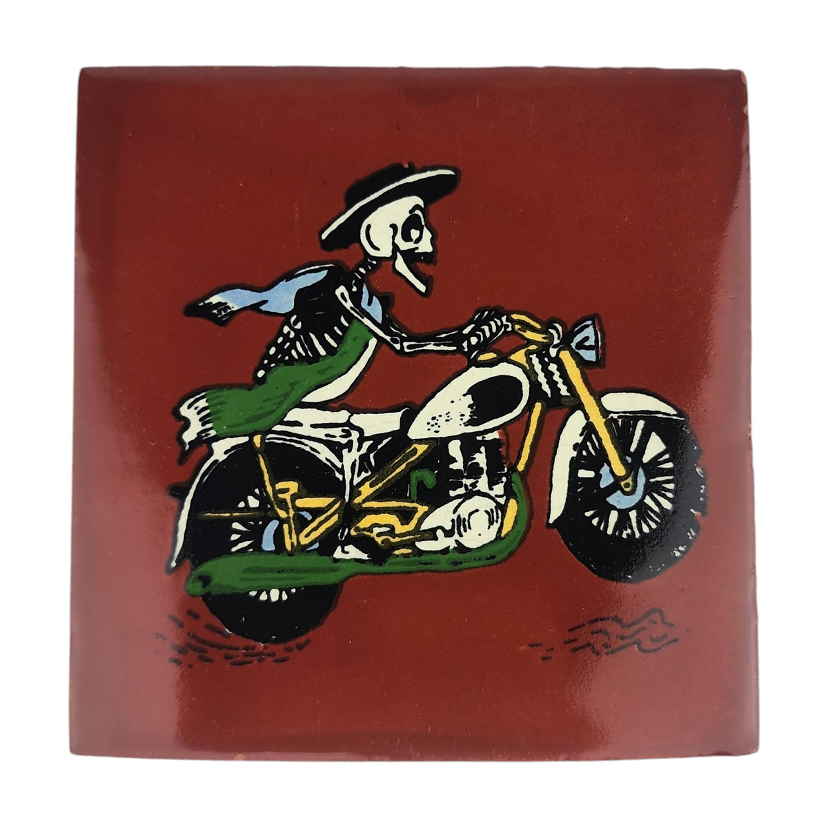 Skeleton Motorcycle ceramic tile with red brown background and Mexican folk art design